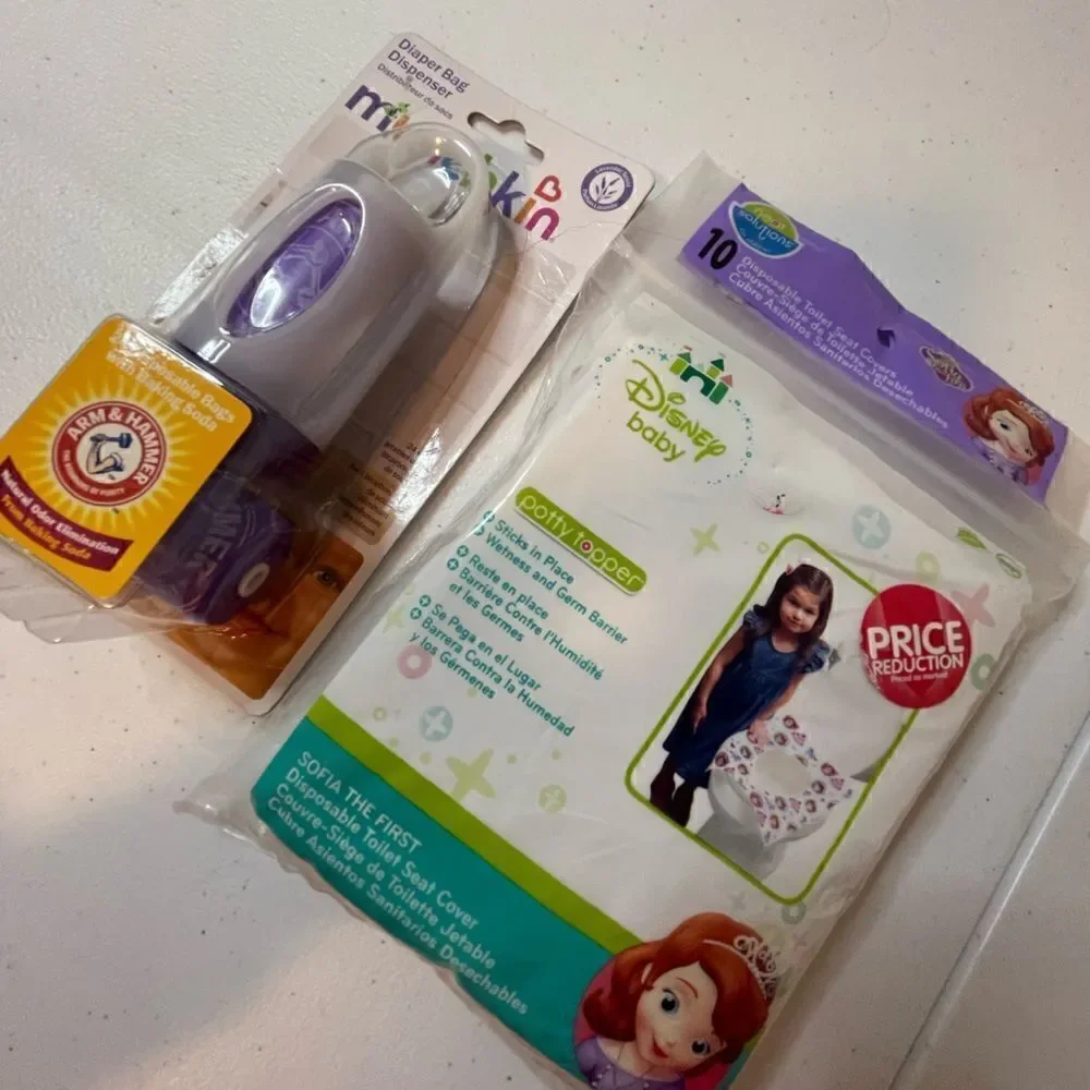 Disney Sophia potty covers and Munchkin diaper bag dispenser lot bundle